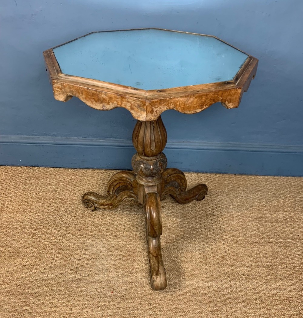 An early Victorian walnut veneered octagonal table circa 1860