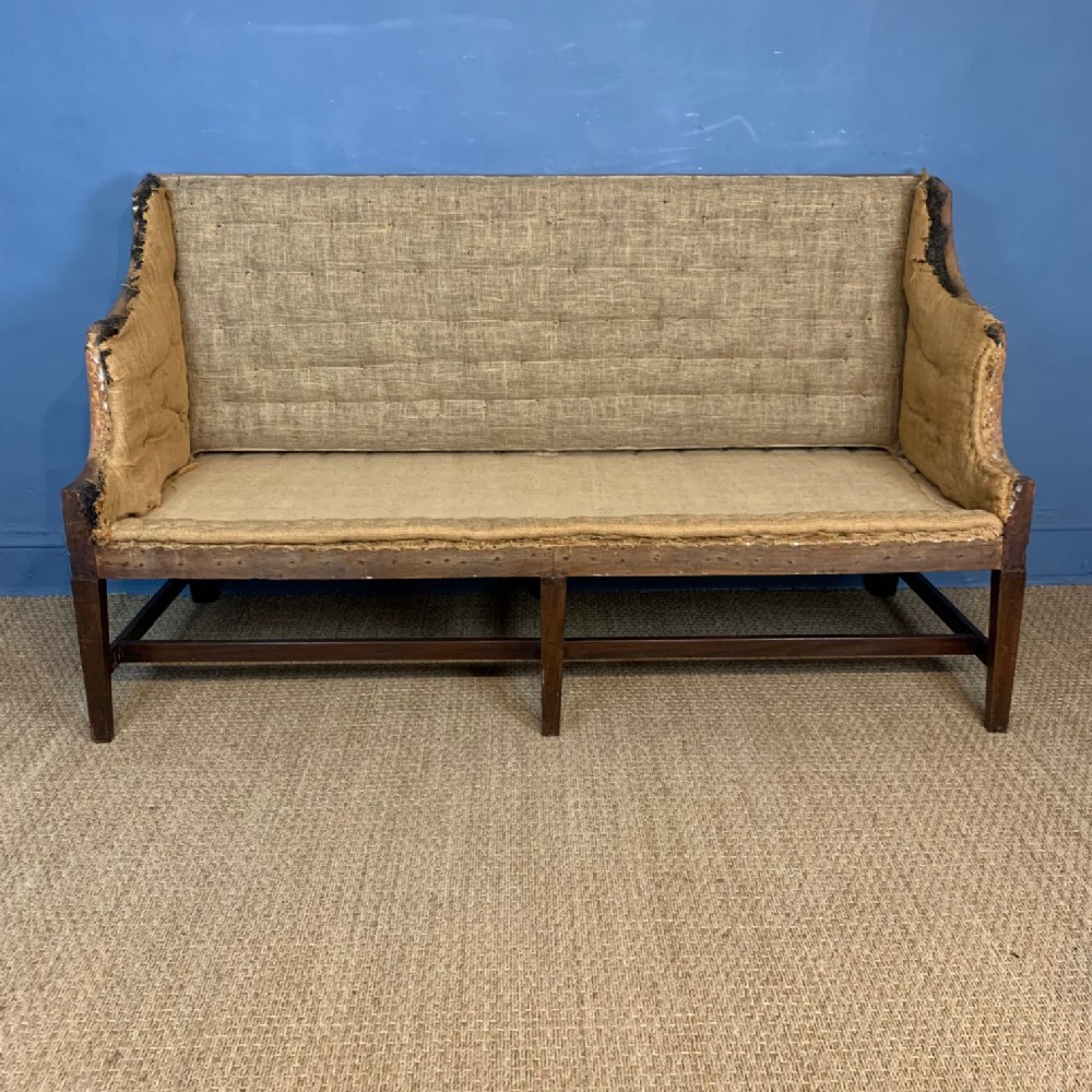 A George III mahogany sofa circa 1780