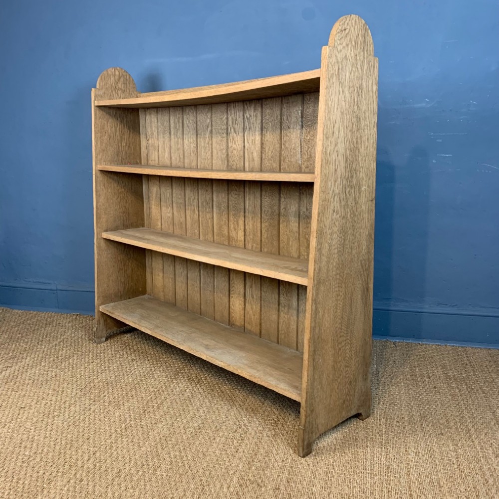 A Heals oak Letchworth open bookcase circa 1910 .