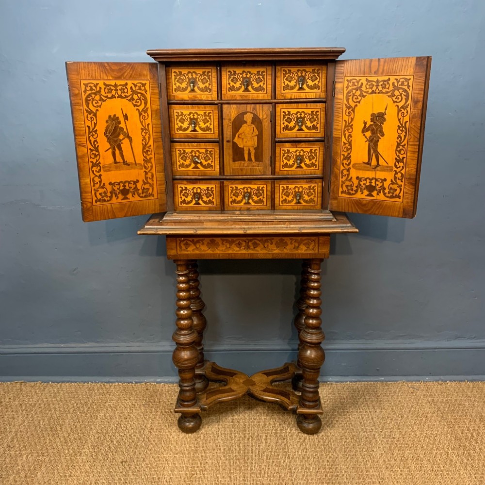 A 19th Century German inlaid marquetry cabinet on stand circa 1880