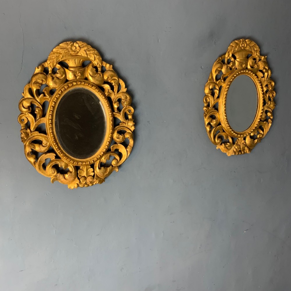 A pair of late 19th Century Florentine carved giltwood mirrors circa 1880
