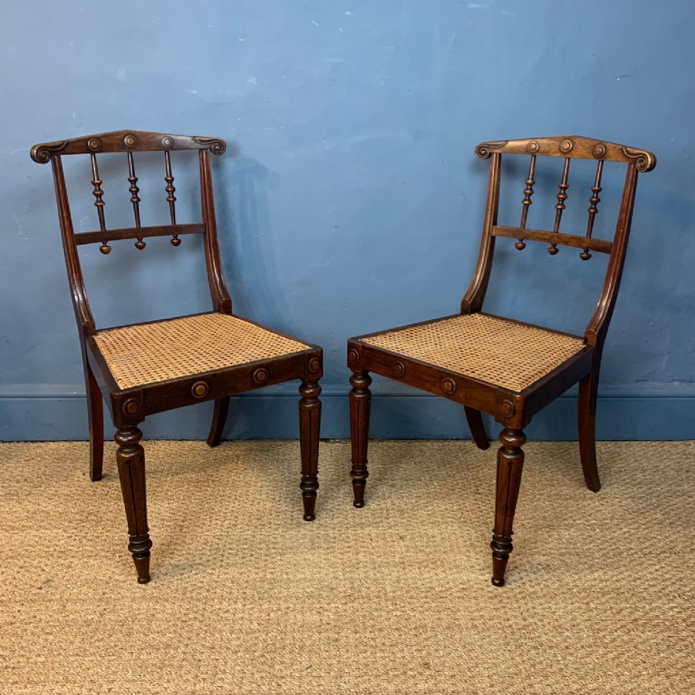 A pair of George IV faded rosewood side chairs in the manner of Seddon & Co