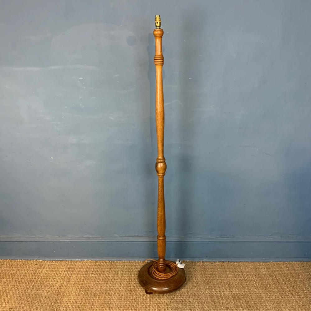 A Heals oak standard lamp circa 1930