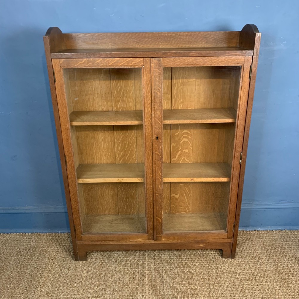 A rare Ambrose Heal oak Letchworth bookcase circa 1908 