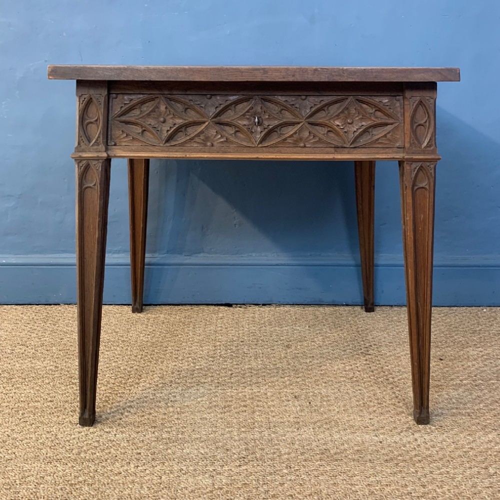 A French Gothic oak writing table circa 1840