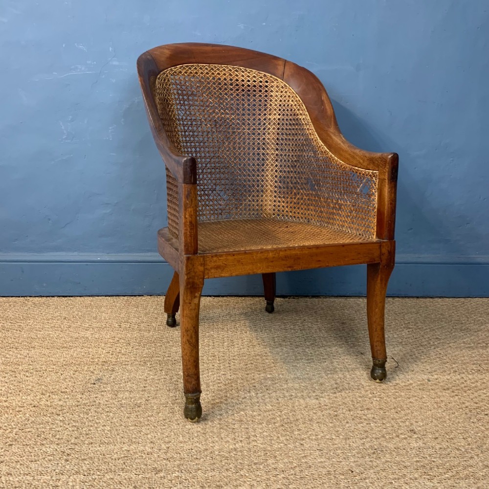 A George IV mahogany bergere chair circa 1830
