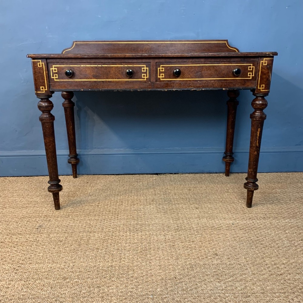 An early Victorian painted pine simulated acacia and gilt dressing table circa 1850