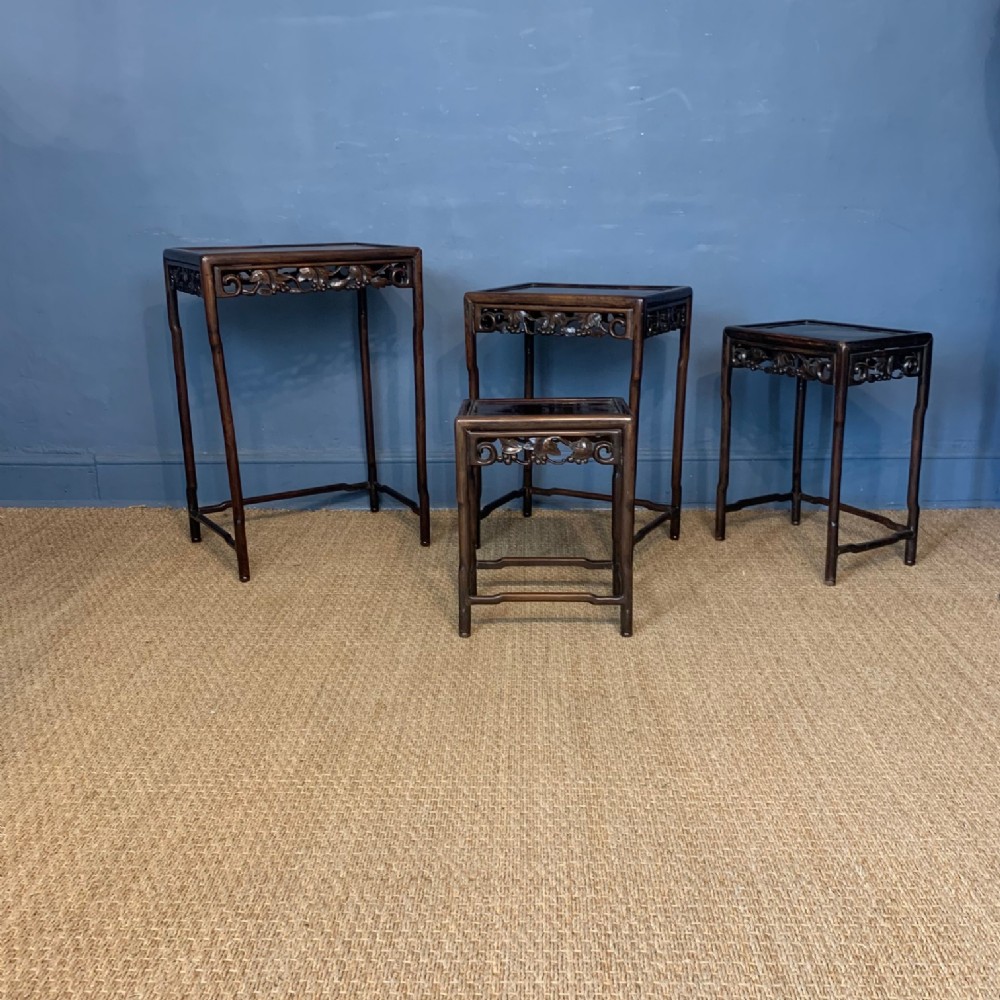  A nest of 4 Chinese Padouk Tables circa 1900 in good solid condition 