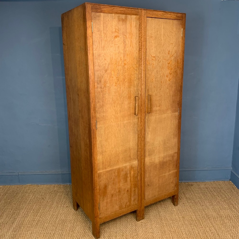 A Heals limed oak wardrobe circa 1930