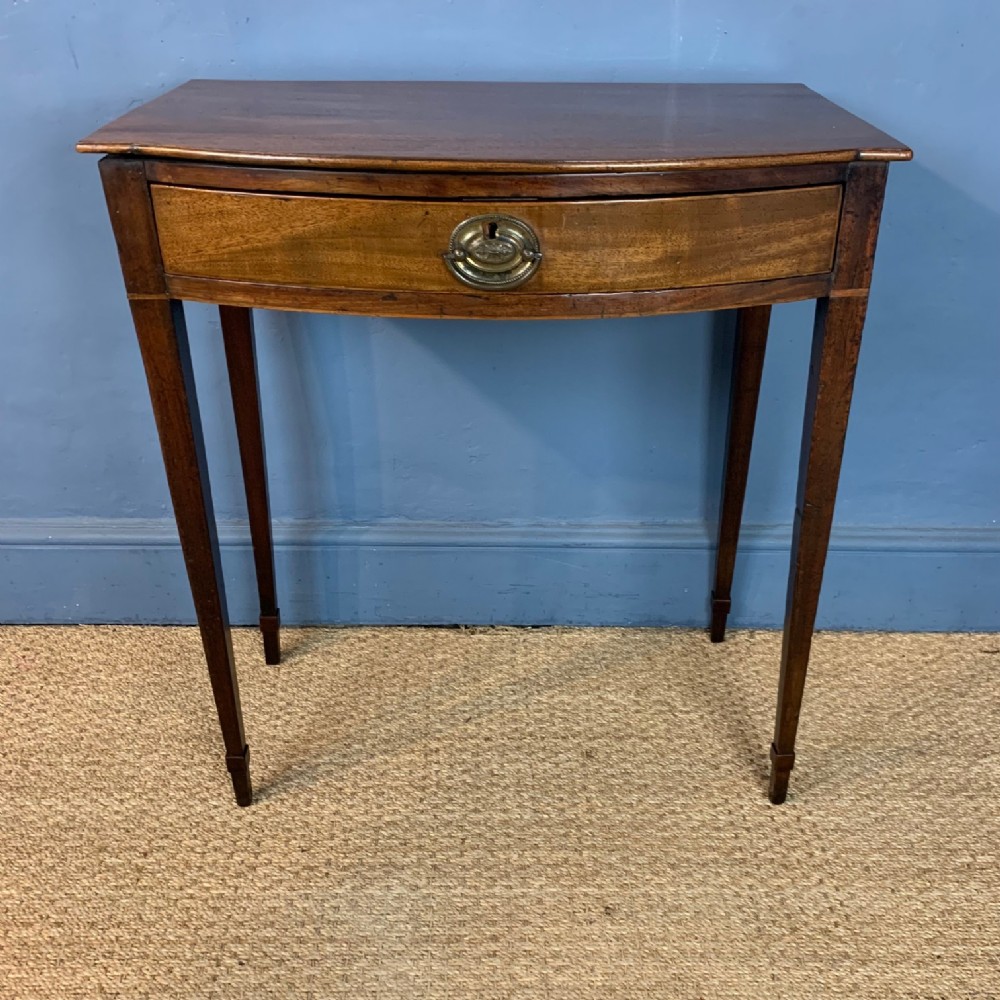 A small George IV mahogany bow front side table circa 1820