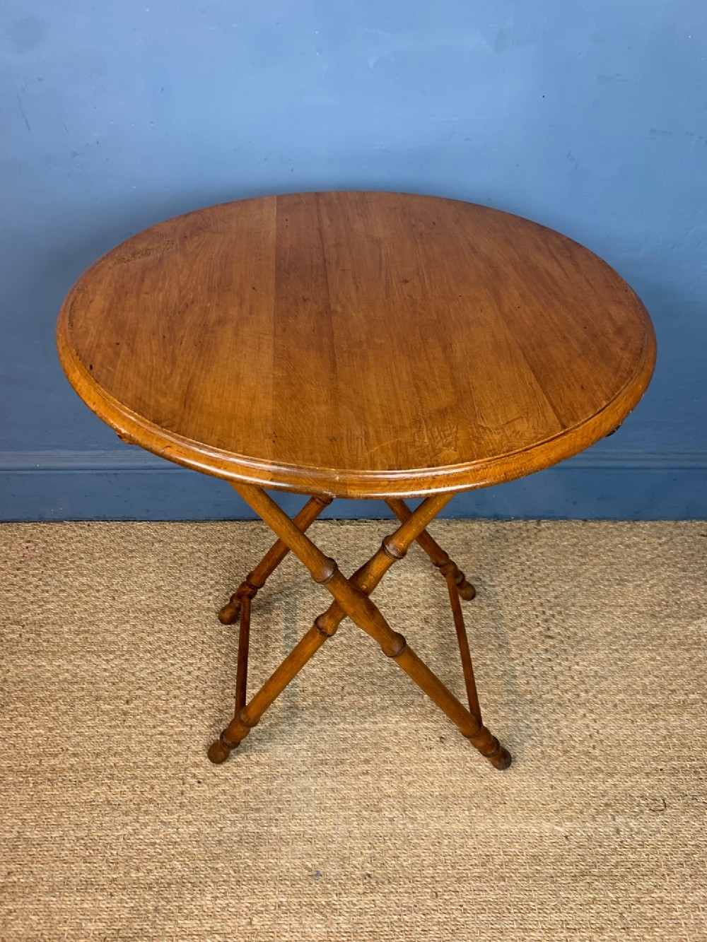 A Victorian Birchwood circular folding butler's table circa 1890 