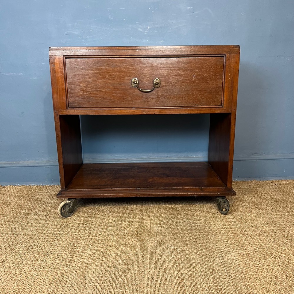 An unusual Edwardian teak book or drinks trolley c 1910