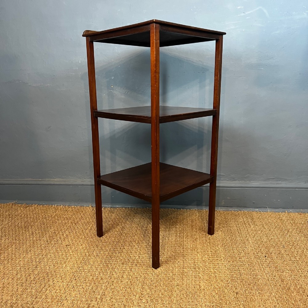 A George 111 mahogany three tier stand circa 1810