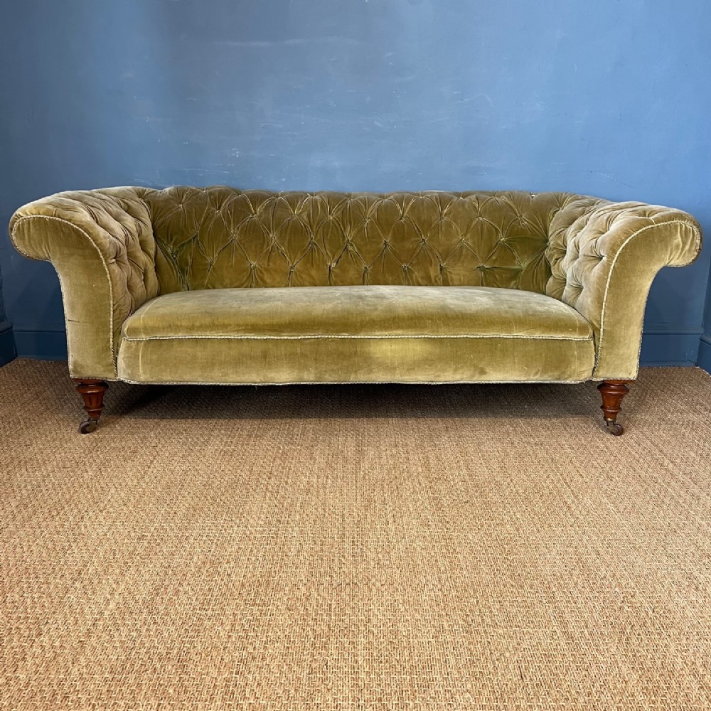 A large Victorian walnut country house chesterfield sofa circa 1870