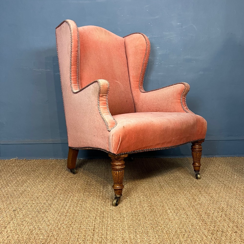 A Victorian oak wing back library chair circa 1880 