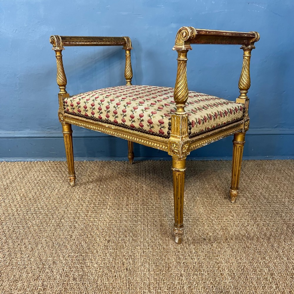 A Victorian carved giltwood stool circa 1870