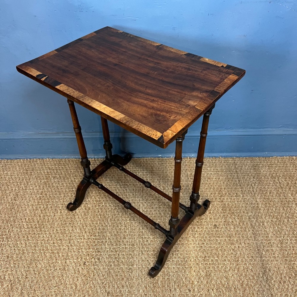 A George IV mahogany and rosewood crossbanded lamp table circa 1825