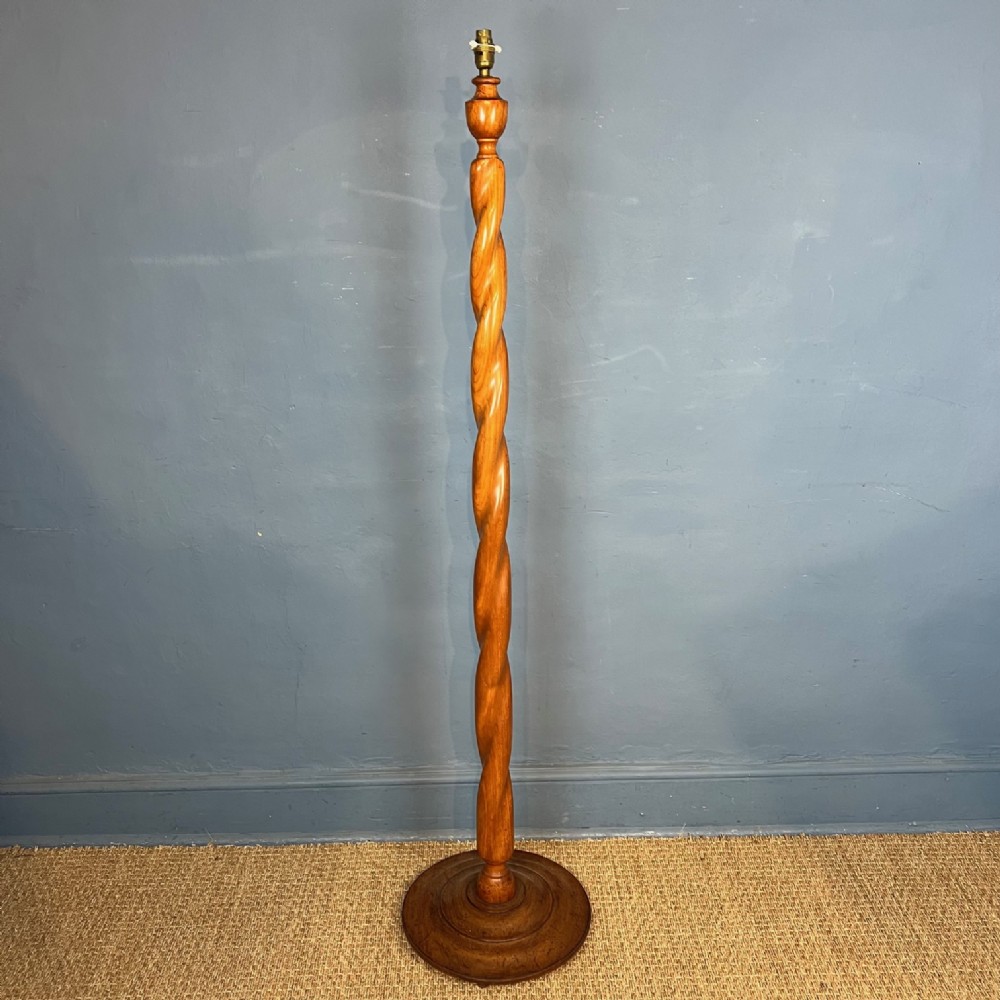 An unusual Arts and Crafts twist column walnut standard lamp circa 1930