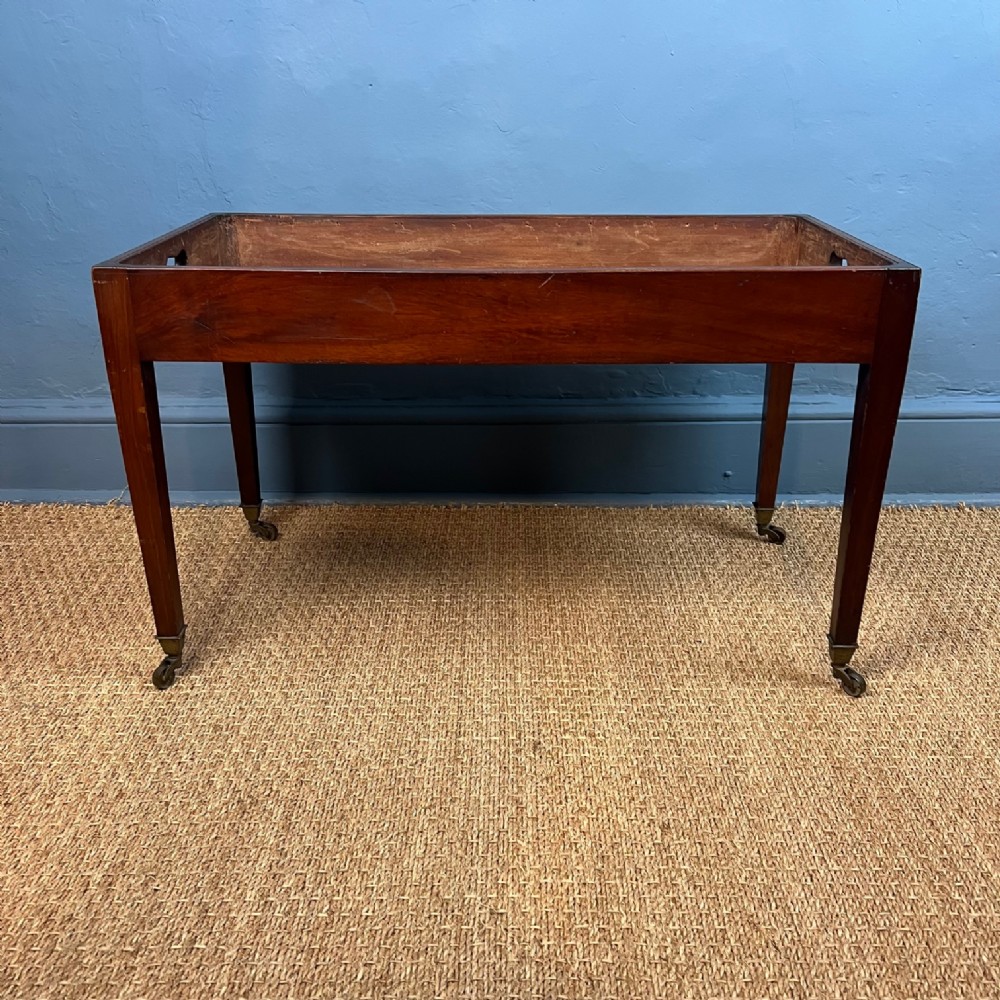 A late 19th c mahogany tray stand circa 1890
