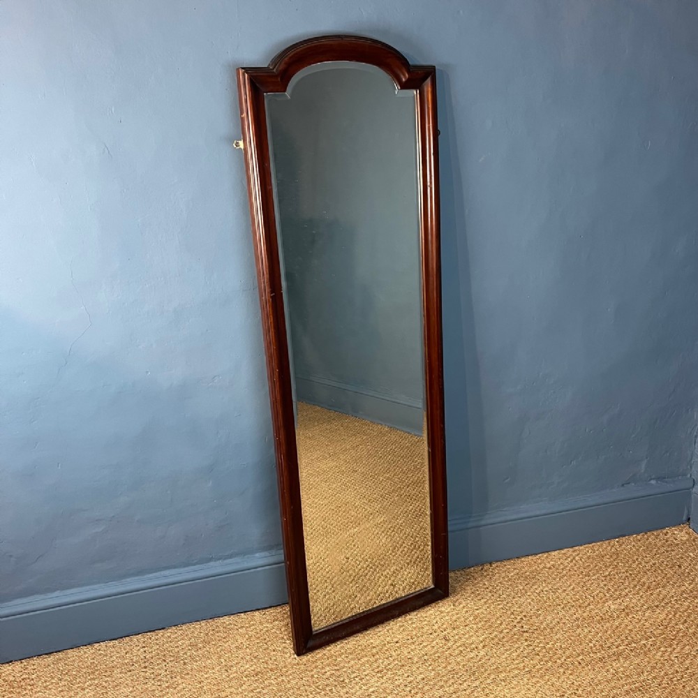 A Victorian mahogany arched shop mirror circa 1890