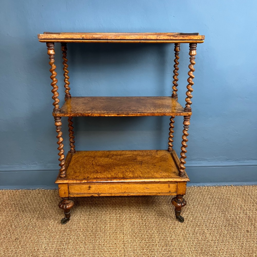 A mid 19th Birds Eye maple 3 tier stand  circa 1850