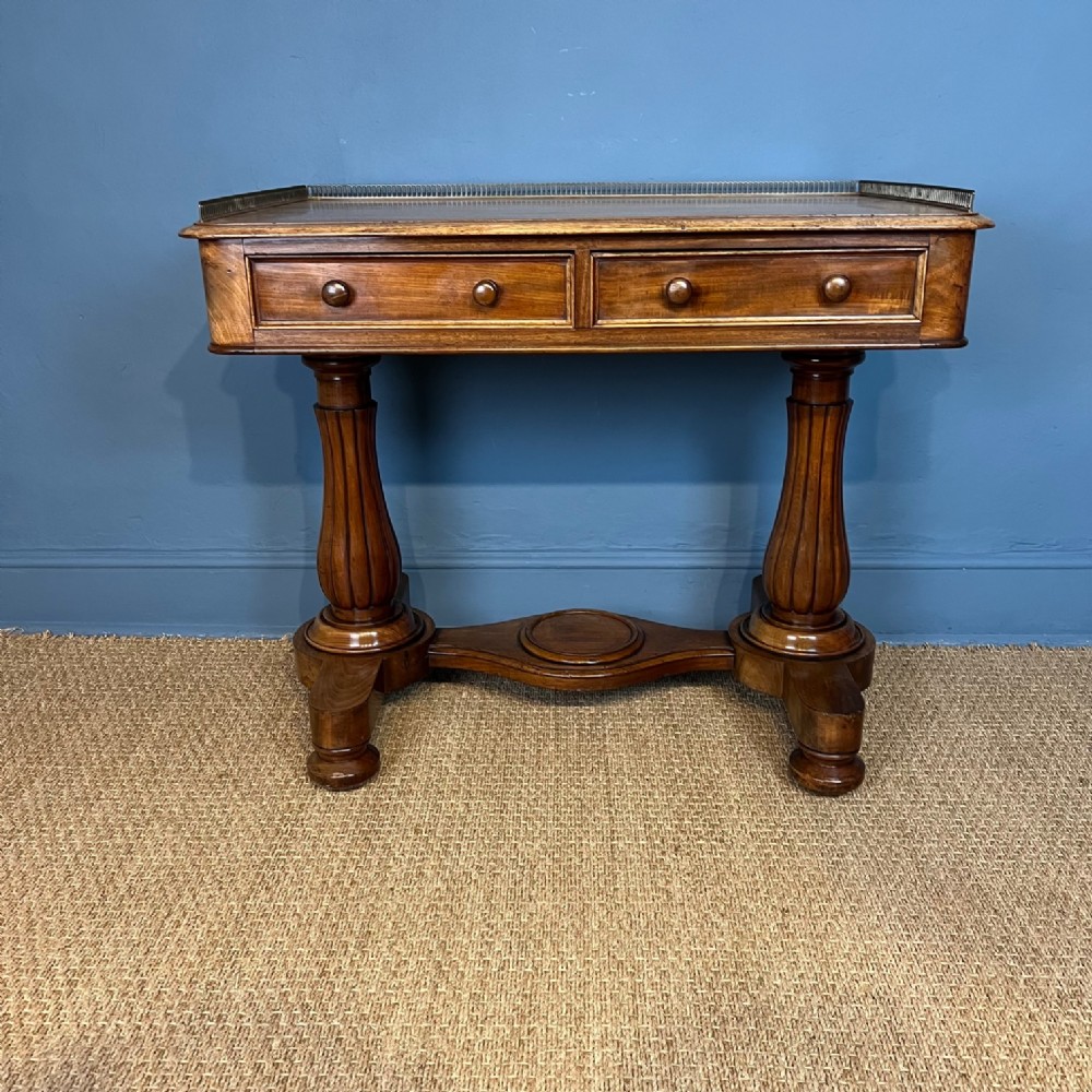 A mid 19th c faded mahogany writing table circa 1840 