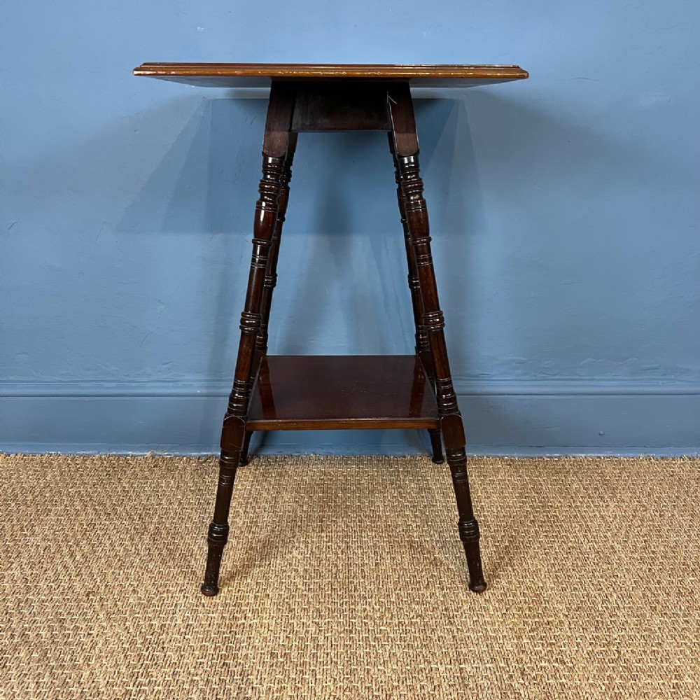 An Aesthetic Movement mahogany 2 tier table circa 1890