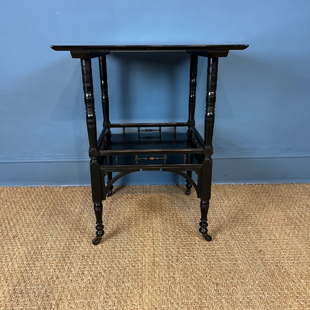 An Aesthetic Movement ebonised 2 tier table circa 1880