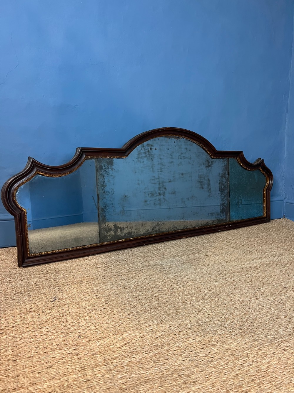 An 18th century Italian walnut rococo overmantel mirror circa 1760