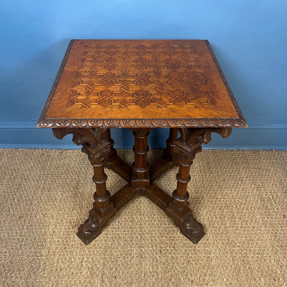 A Gothic oak parquetry square table circa 1860 probably 