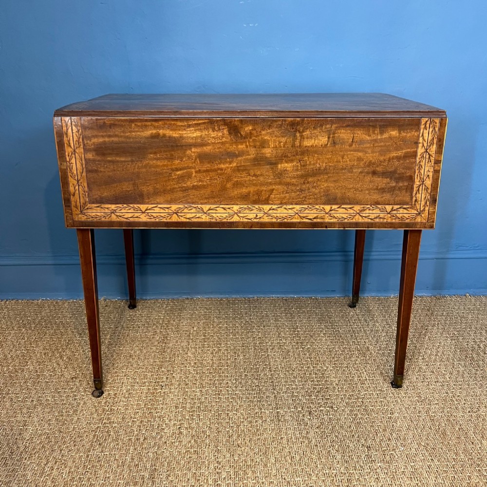 A George III mahogany and marquetry Pembroke table circa 1790 