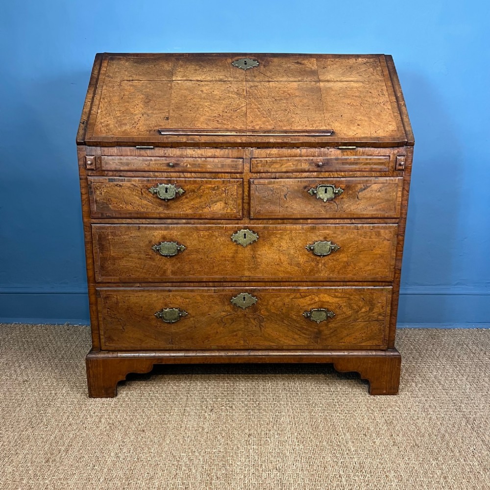 A George 1 walnut bureau circa 1725
