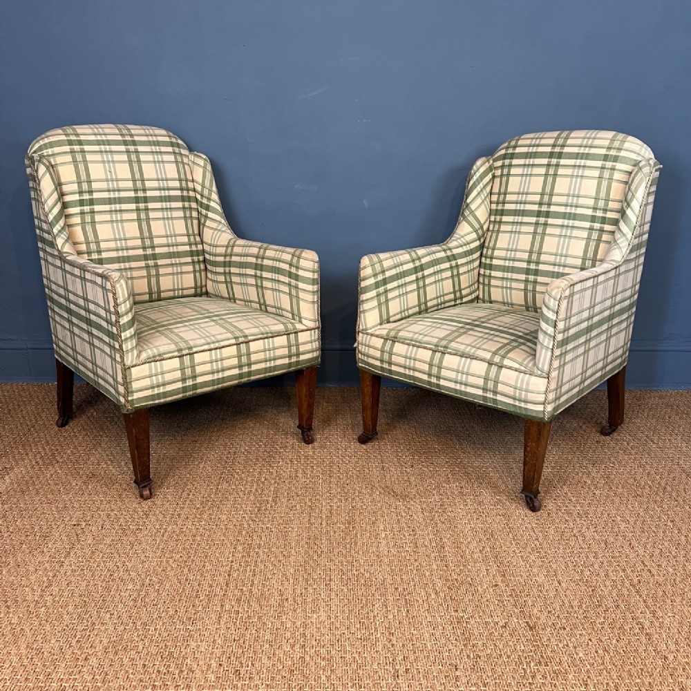 A pair of Edwardian mahogany armchairs circa 1910