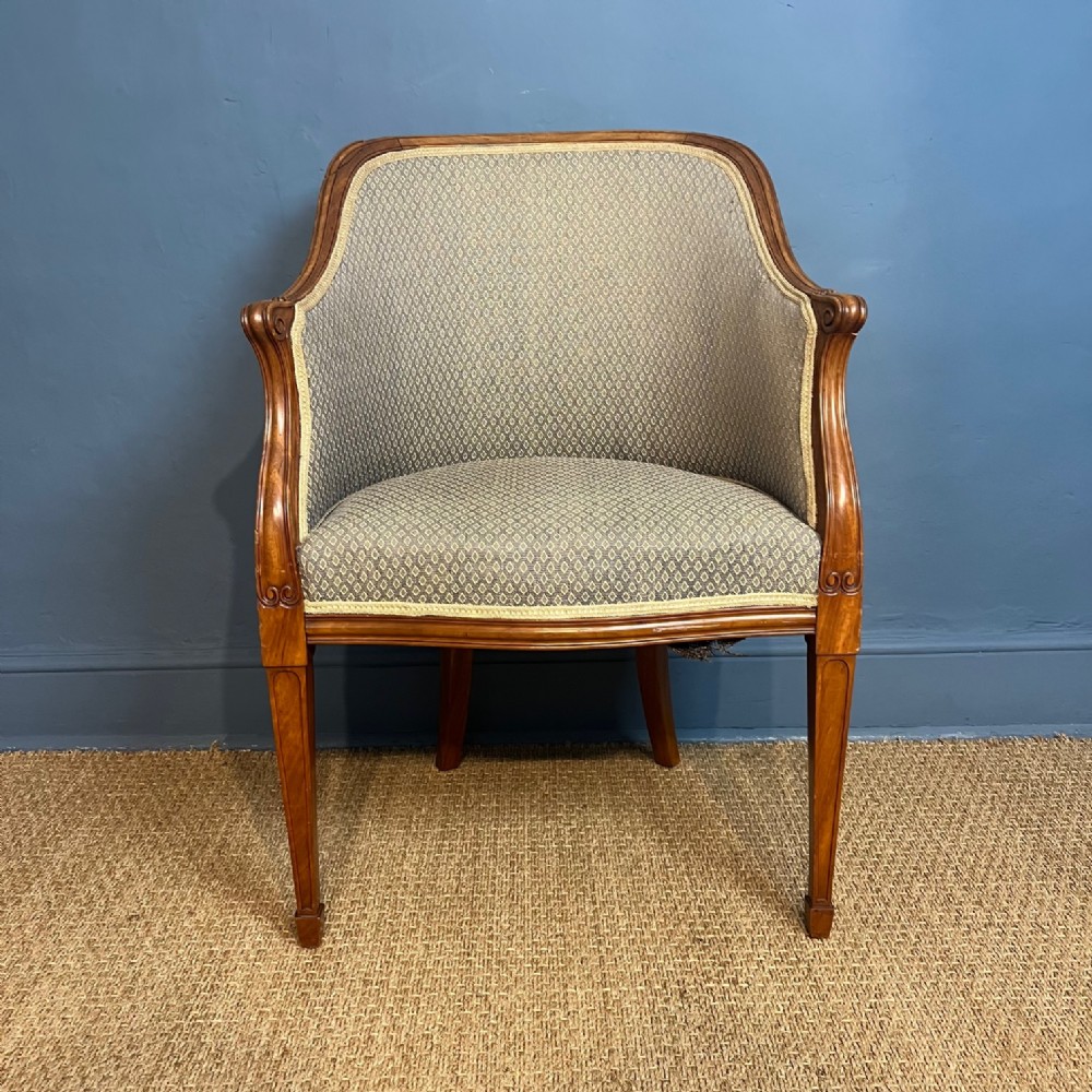 A late Regency solid satinwood desk chair circa 1830