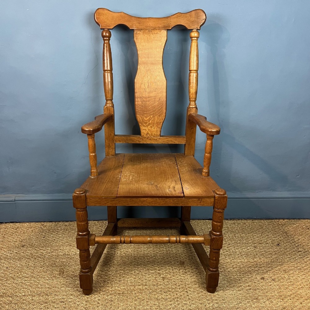 An unusual Cotswold oak armchair circa 1930
