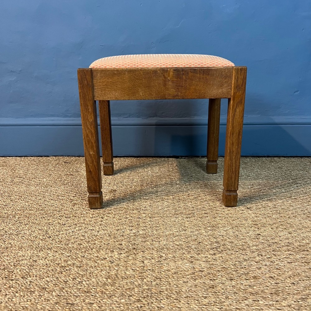 A Heals oak rectangular stool circa 1930