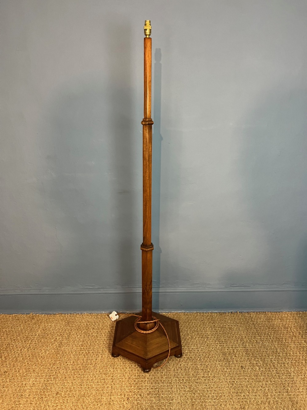 A Heals walnut standard lamp circa 1930