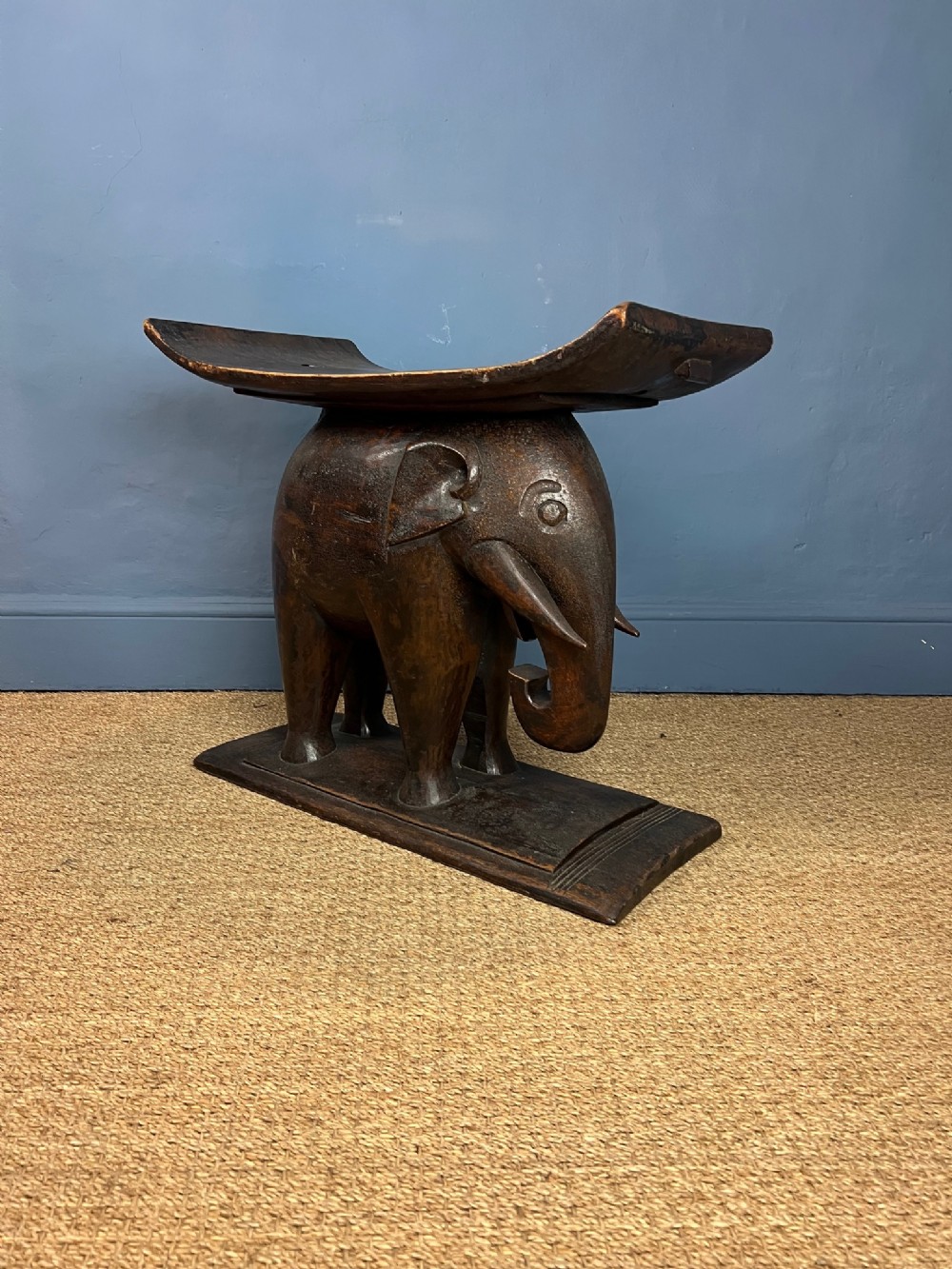 An Ashanti hardwood Elephant stool . Gold Coast ( now Ghana ) circa 1930
