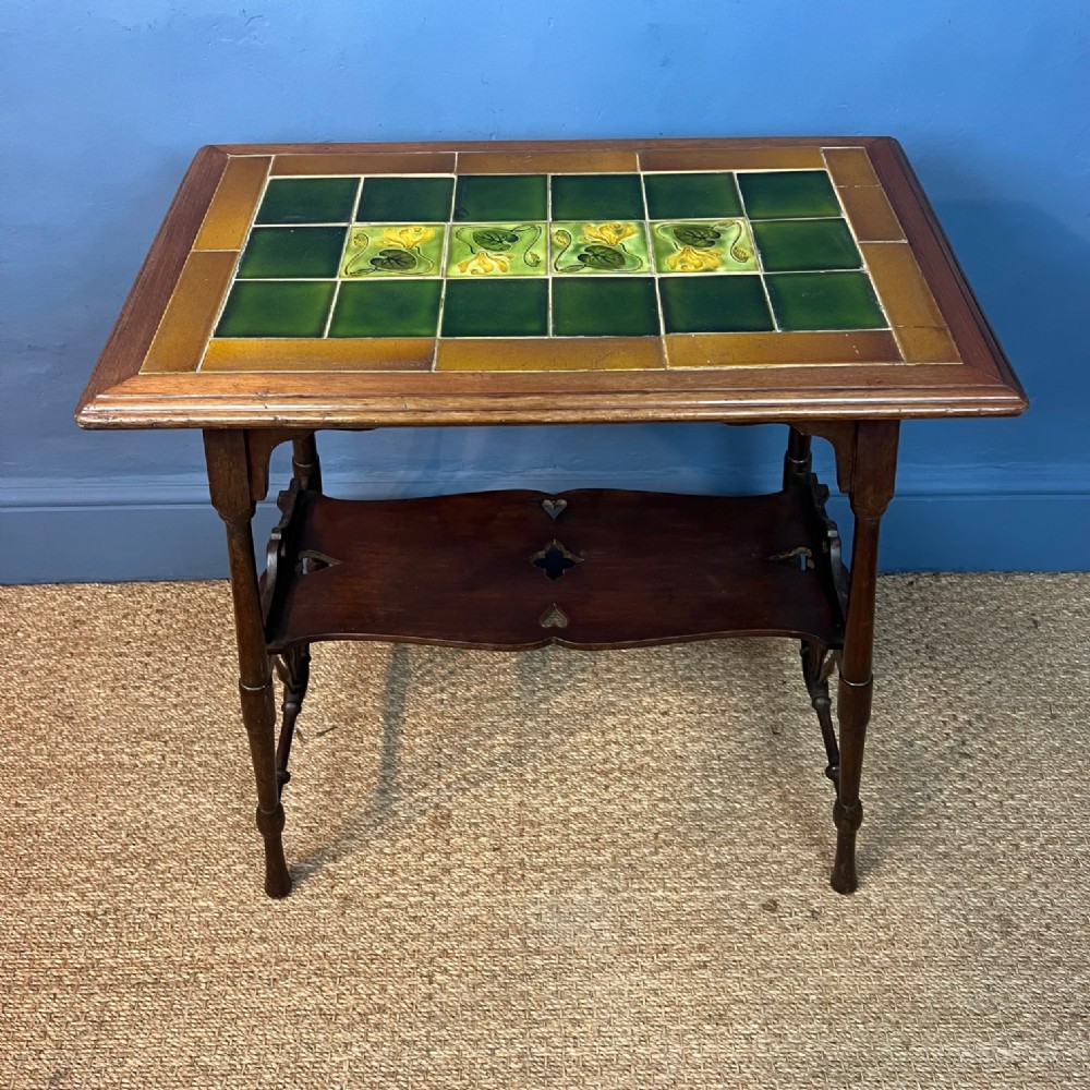 An Arts and Crafts mahogany two-tier table circa 1890 