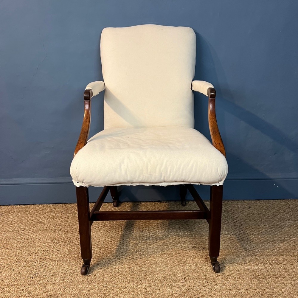 A George III mahogany Gainsborough type armchair circa 1780 