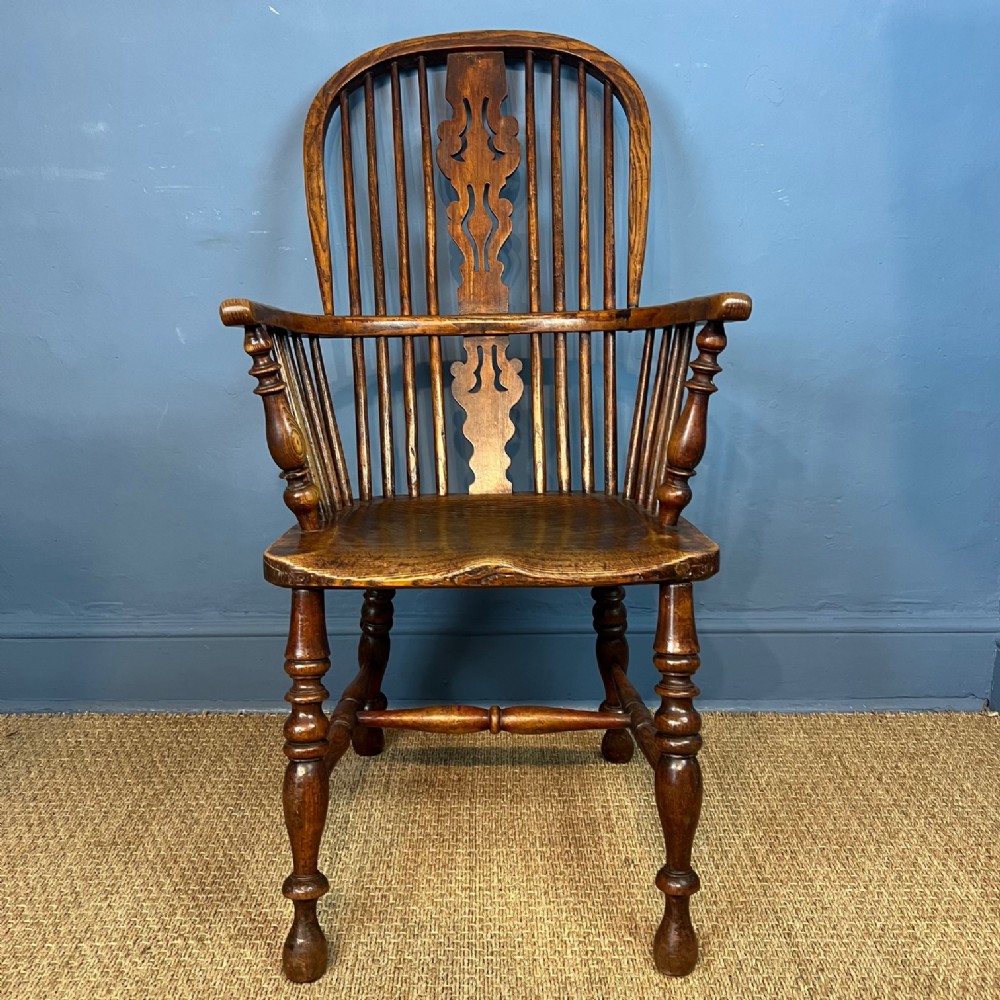 A mid 19th century High Back Ash and elm Windsor Armchair