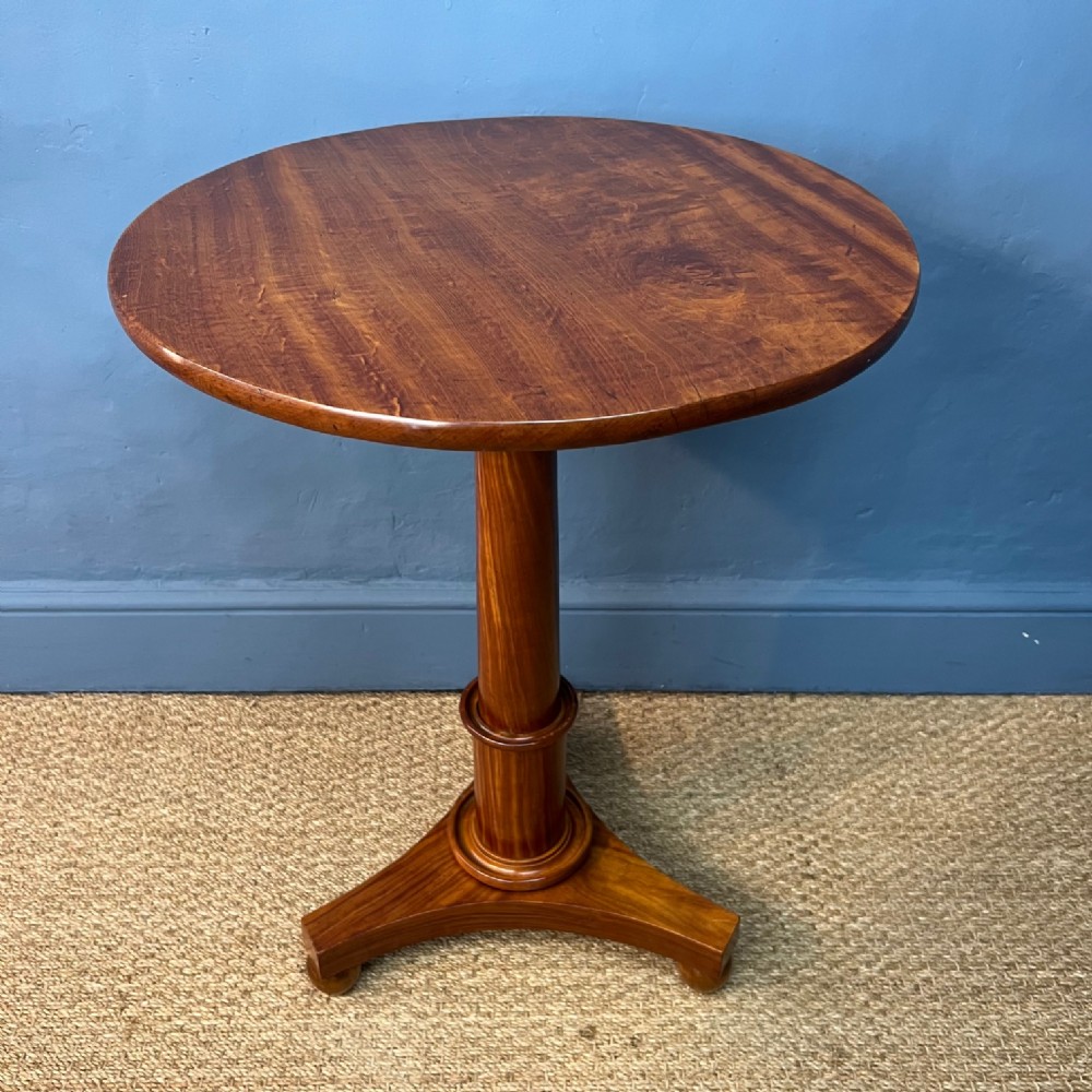 A William IV East Indian Satinwood circular lamp table circa 1835