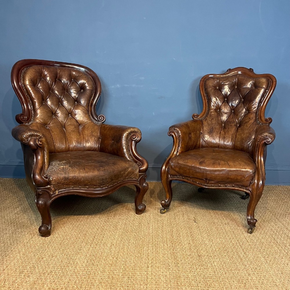 A matched pair of 19th century mahogany and leather library armchairs circa 1870