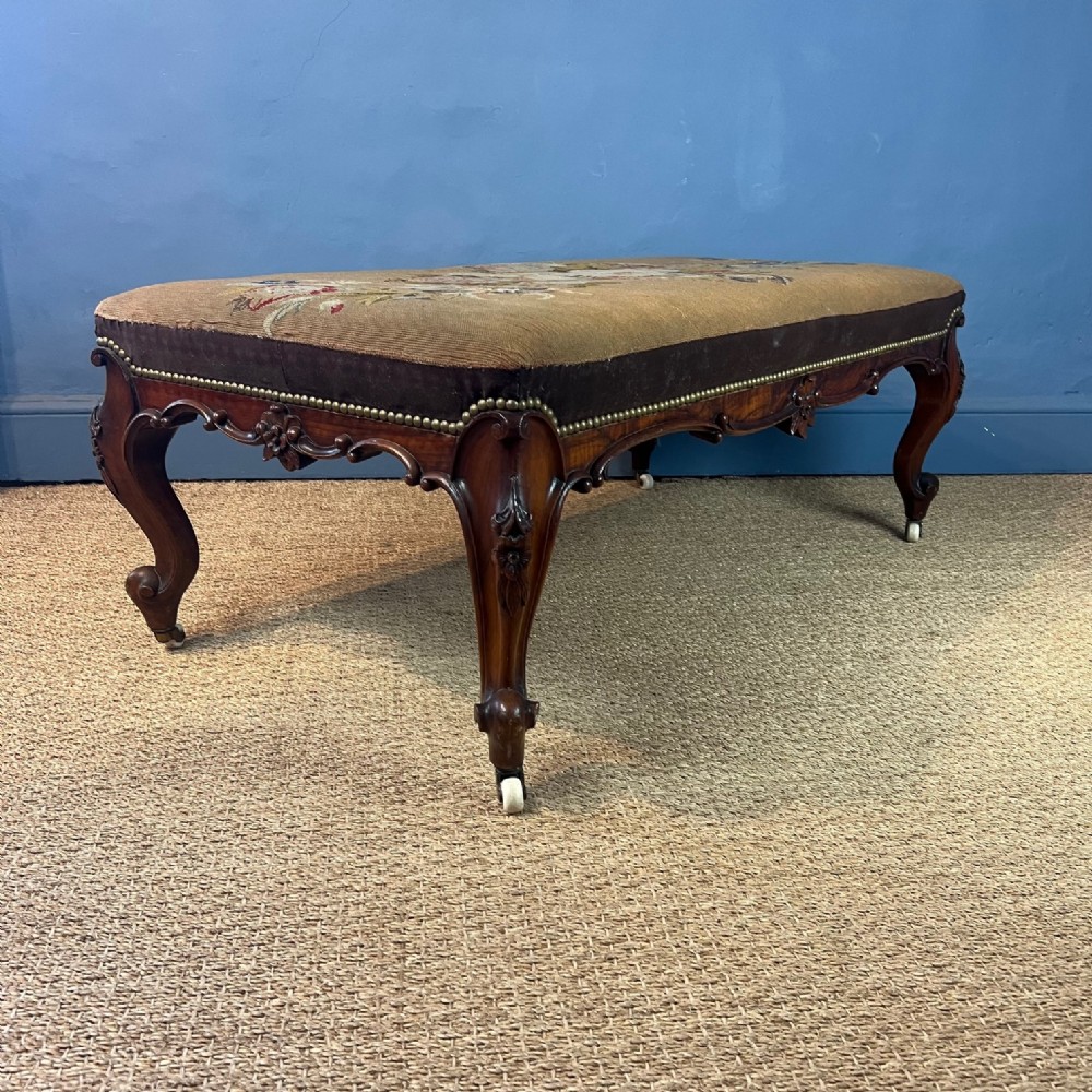 A large early Victorian rosewood cabriole leg stool circa 1860 
