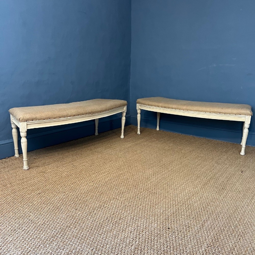 A pair of mid 19th English painted pine alcove widow seats circa 1850 