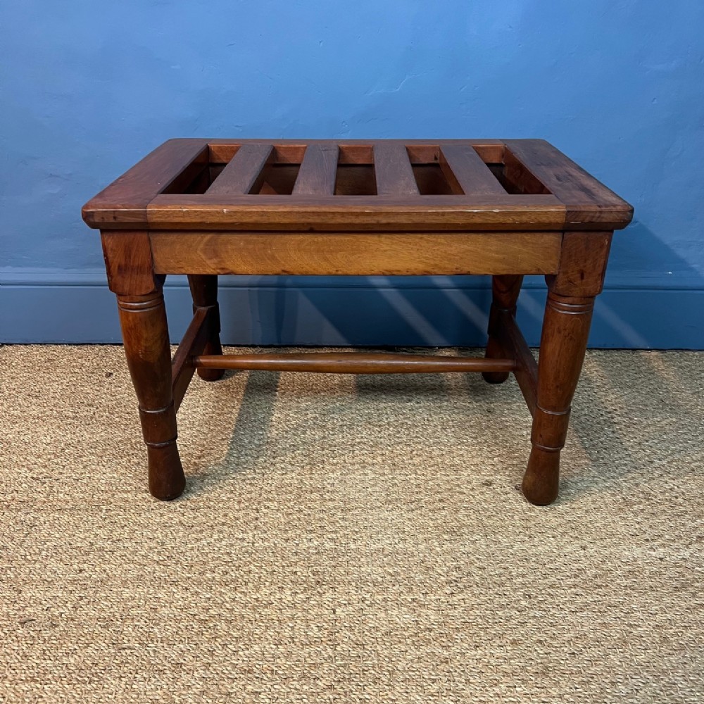 A Lamb of Manchester walnut luggage rack circa 1875 