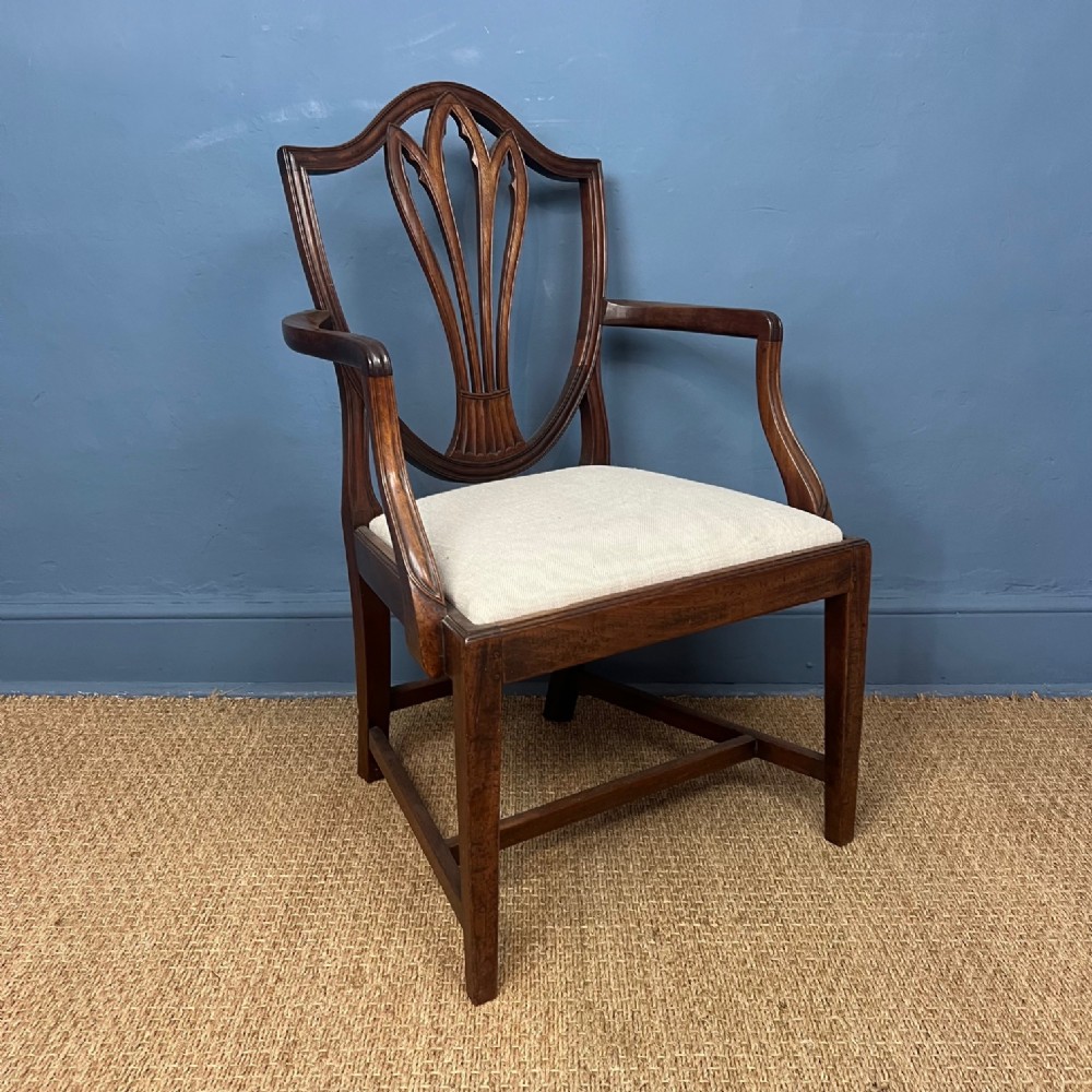 A George 111 mahogany shield back armchair circa 1790