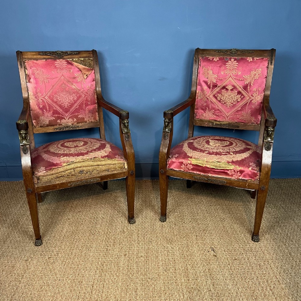  A pair of Napoleon 111 walnut and gilt brass mounted armchairs circa 1870