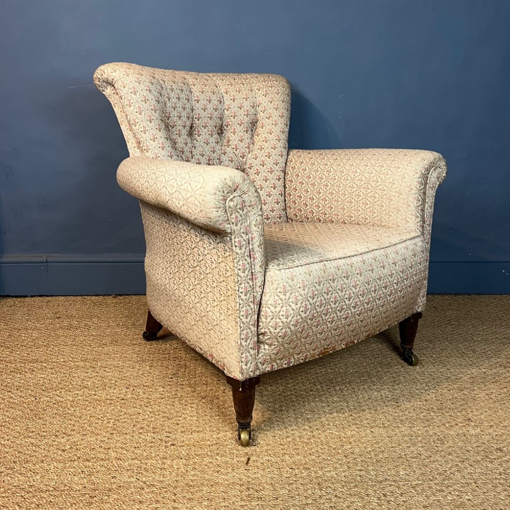 A late 19th century Howard style Woodstock armchair circa 1890