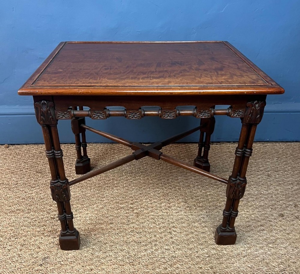 A small late 19th c fiddleback mahogany occasional table circa 1900